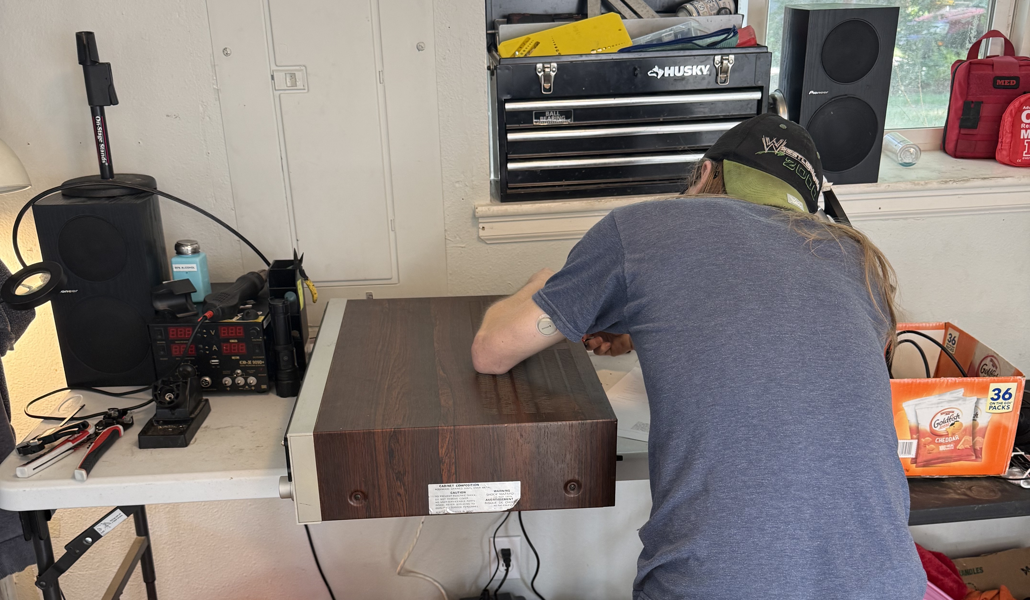 Tj working on a vintage unit on the bench